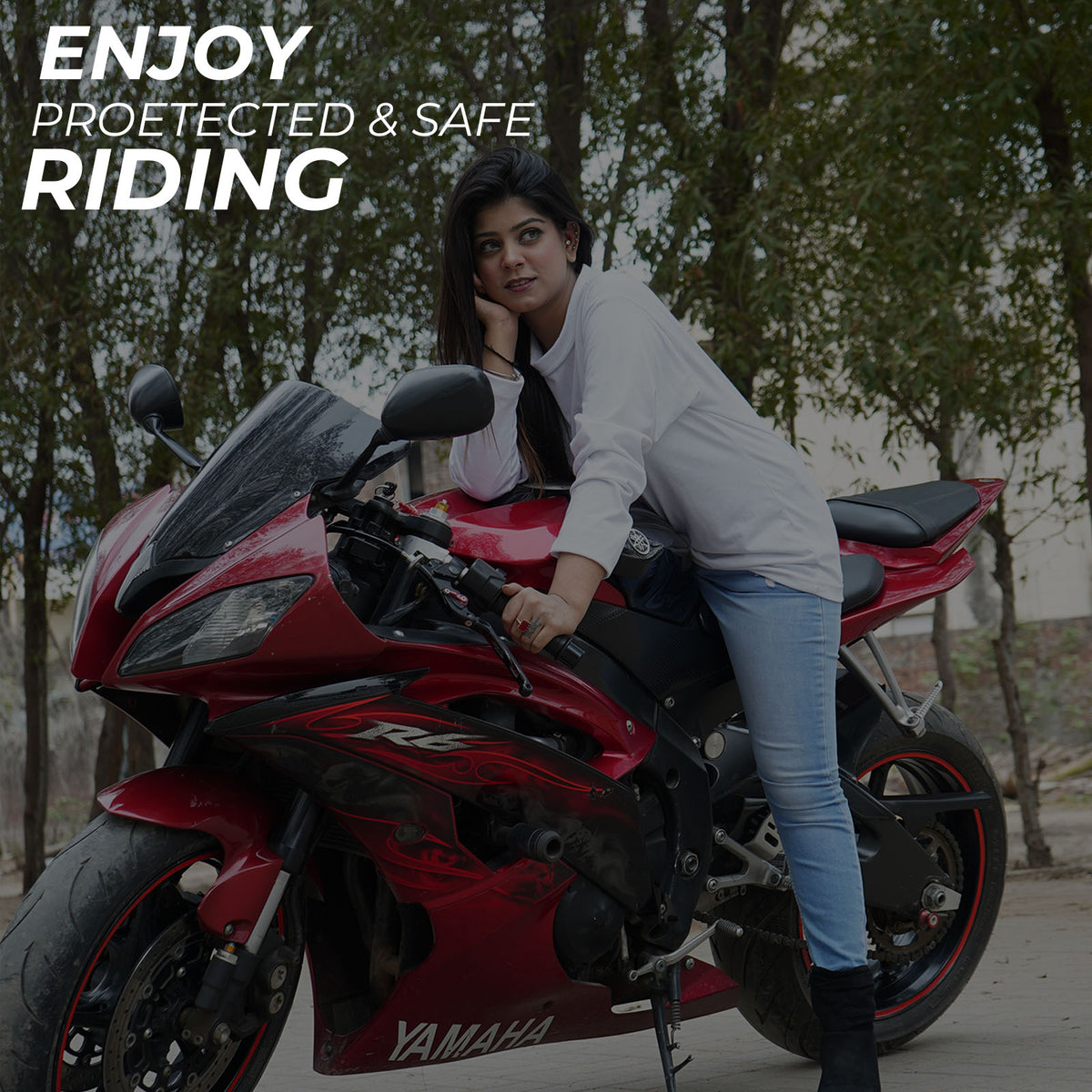 Motorcyclist wearing a Kevlar-lined protective T-shirt while riding.