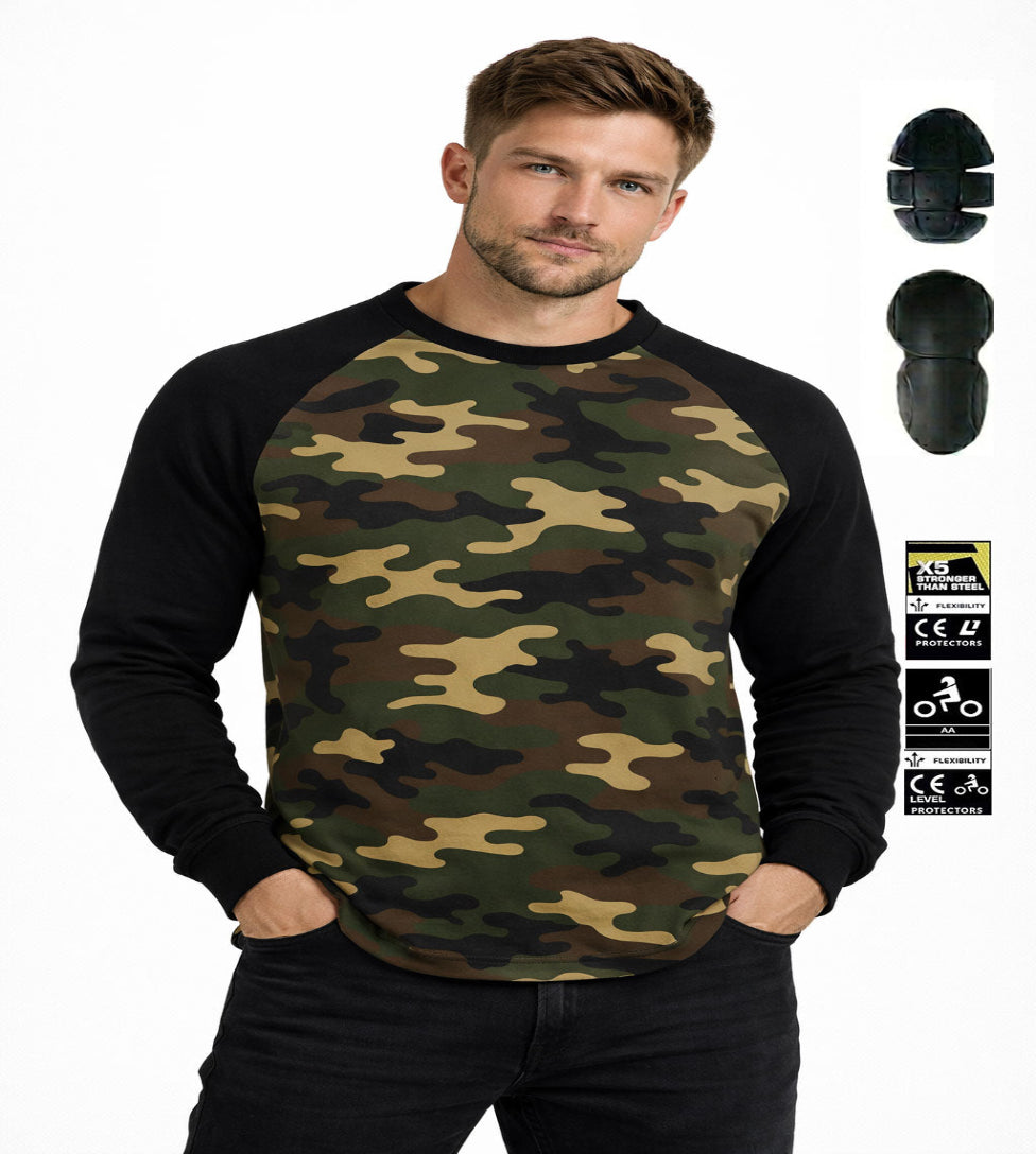 Man wearing a camouflage baseball shirt with black sleeves, standing against a white background.