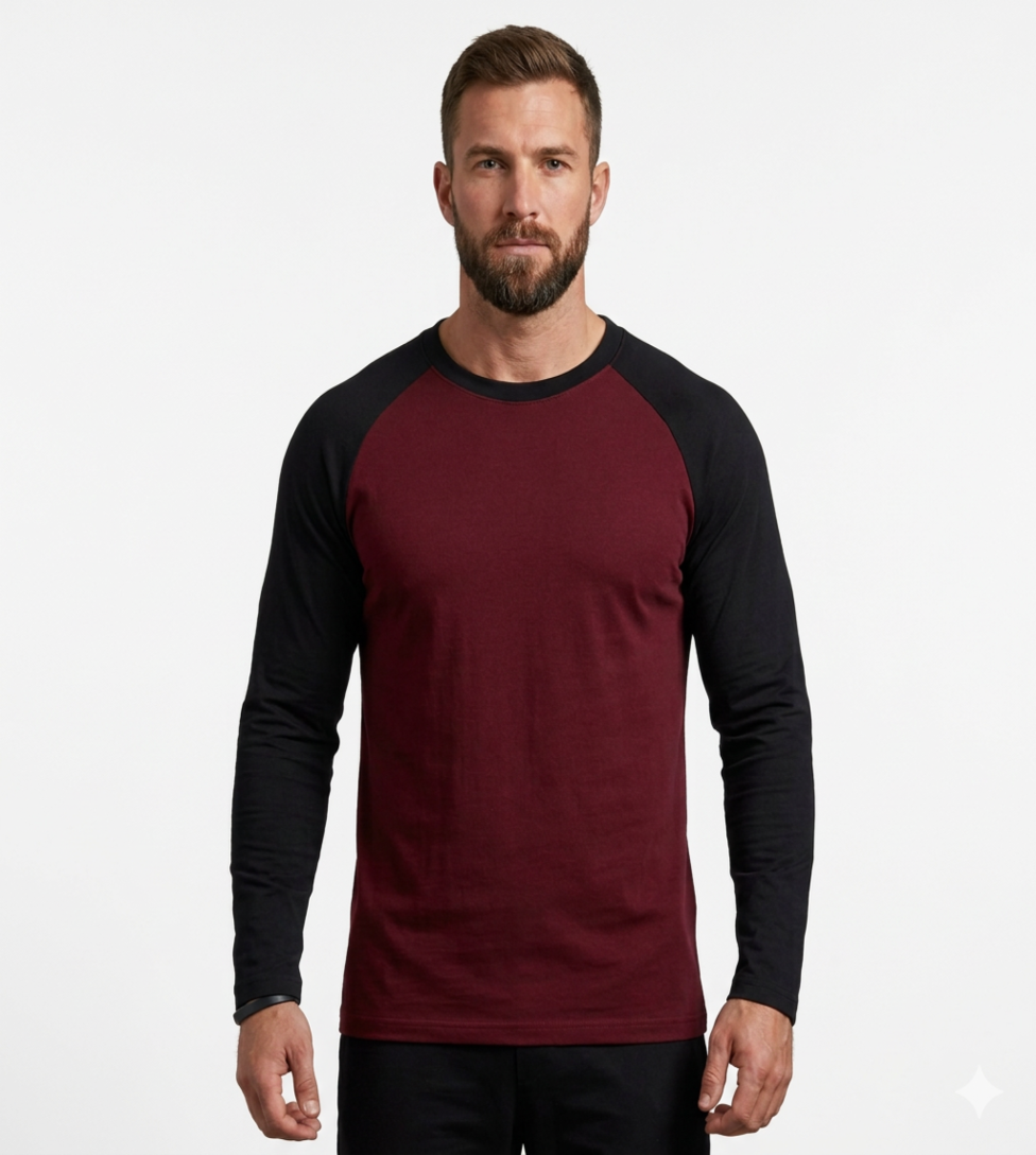 Man wearing a maroon and black long-sleeve shirt on a white background