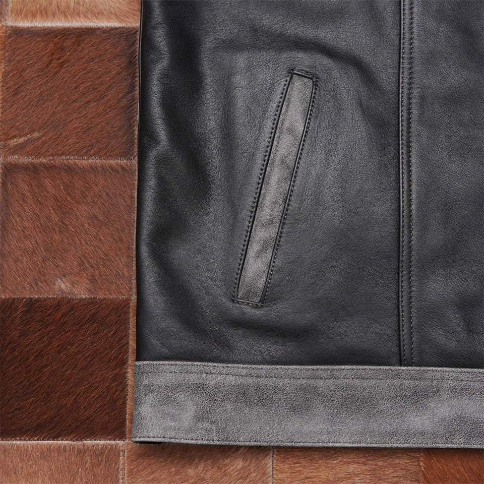 Close-up of a black leather Vest