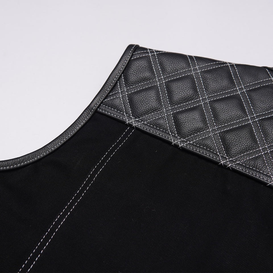 Close-up of a black garment with quilted