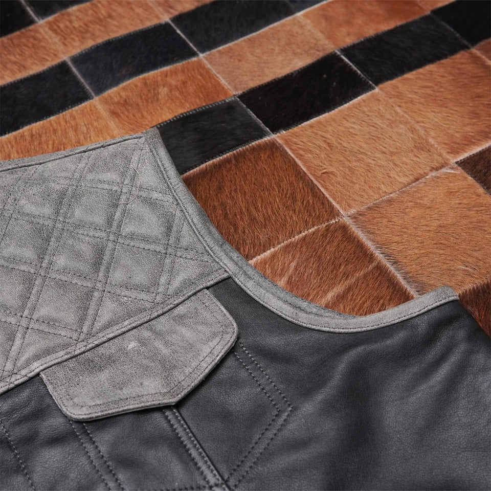 Close-up of a quilted leather Vest with a patchwork pattern