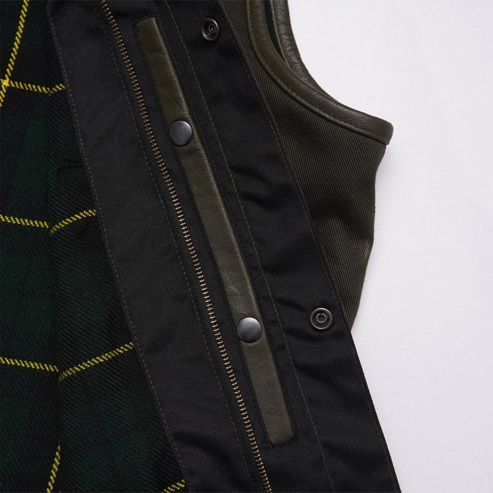 Close-up of a dark green vest with plaid pattern