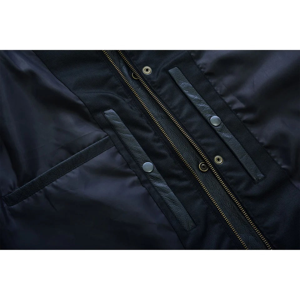 Close-up of a dark jacket with zipper and button 
