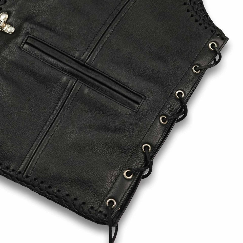 Close-up of a black leather bag with lace-up details
